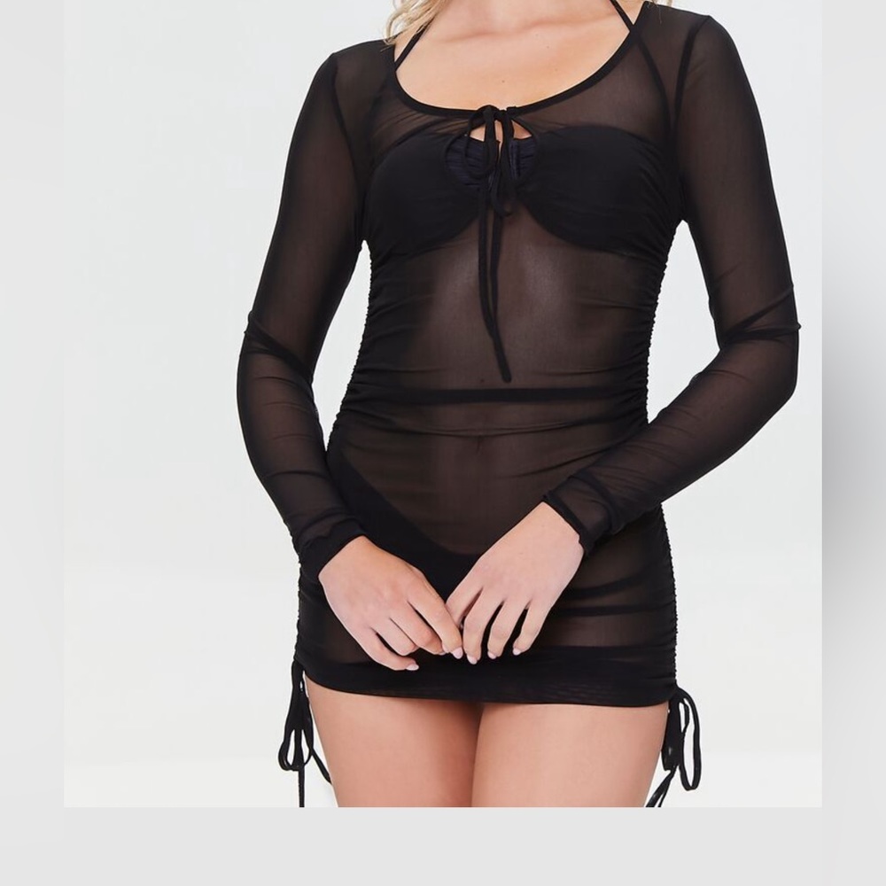 Never worn one piece long sleeve see through cover up swimwear